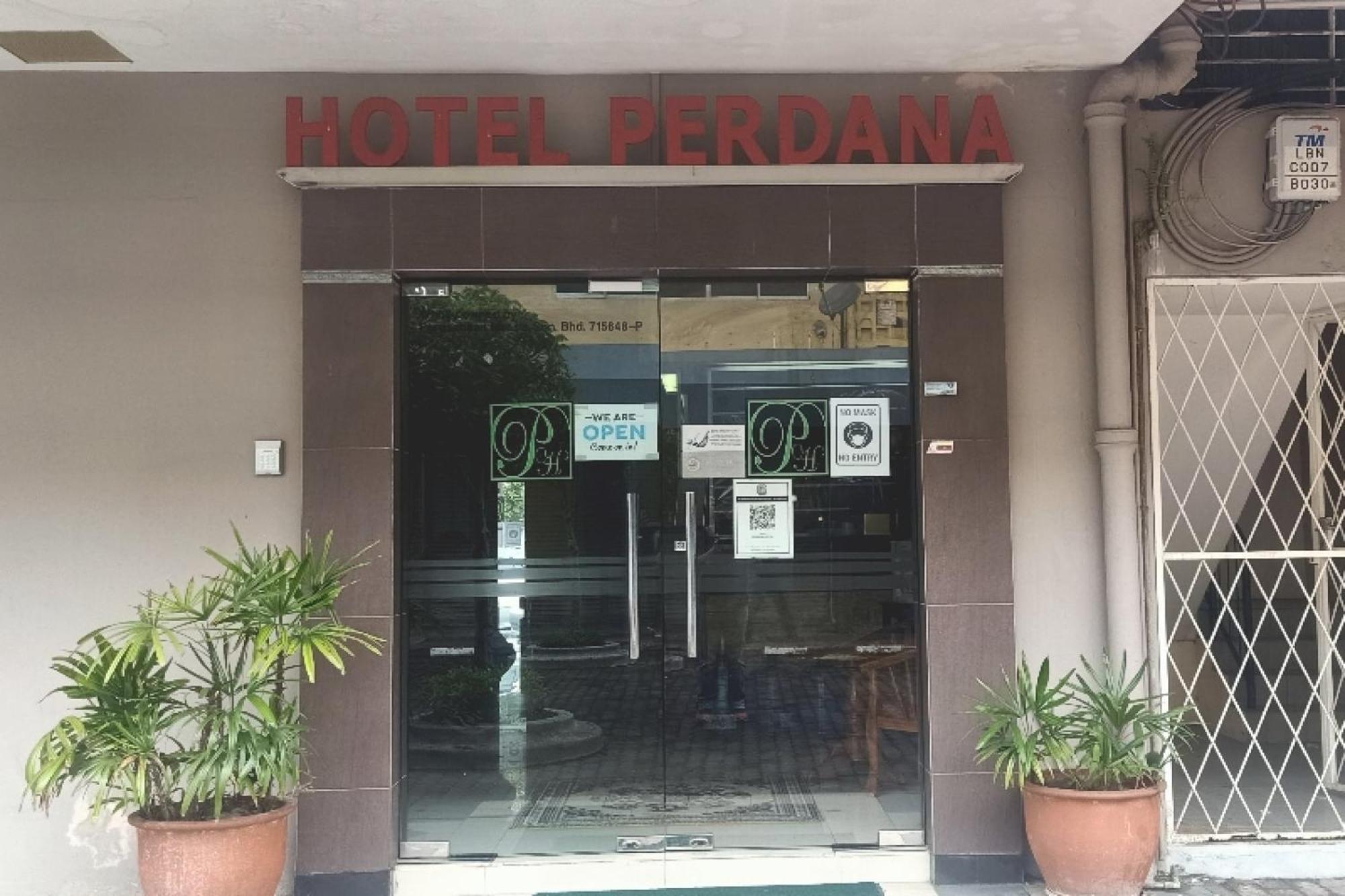 Oyo 90411 Perdana Hotel Лабуан Екстер'єр фото